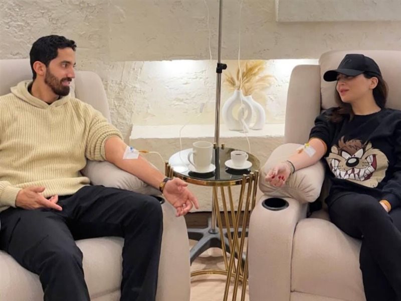 مي عز الدين وزوجها