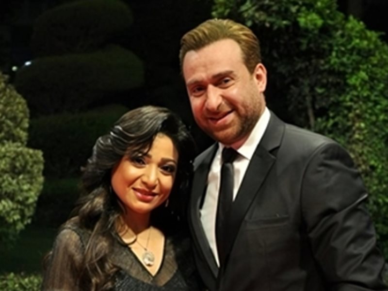 نضال الشافعي وزوجته 