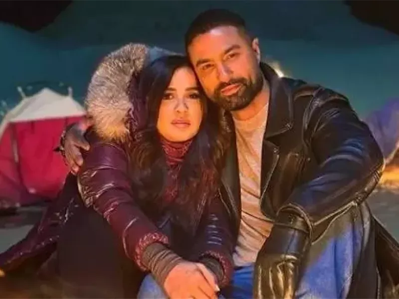 ياسمين عبد العزيز وكريم فهمي