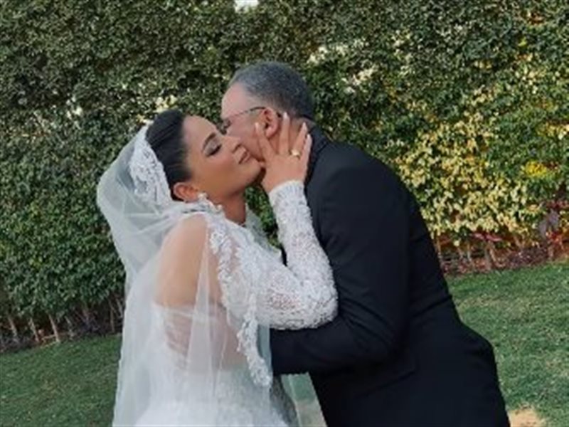 أشرف طلبة وابنته