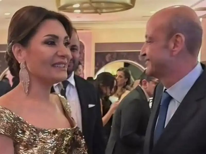 عمرو أديب ودينا طلعت 